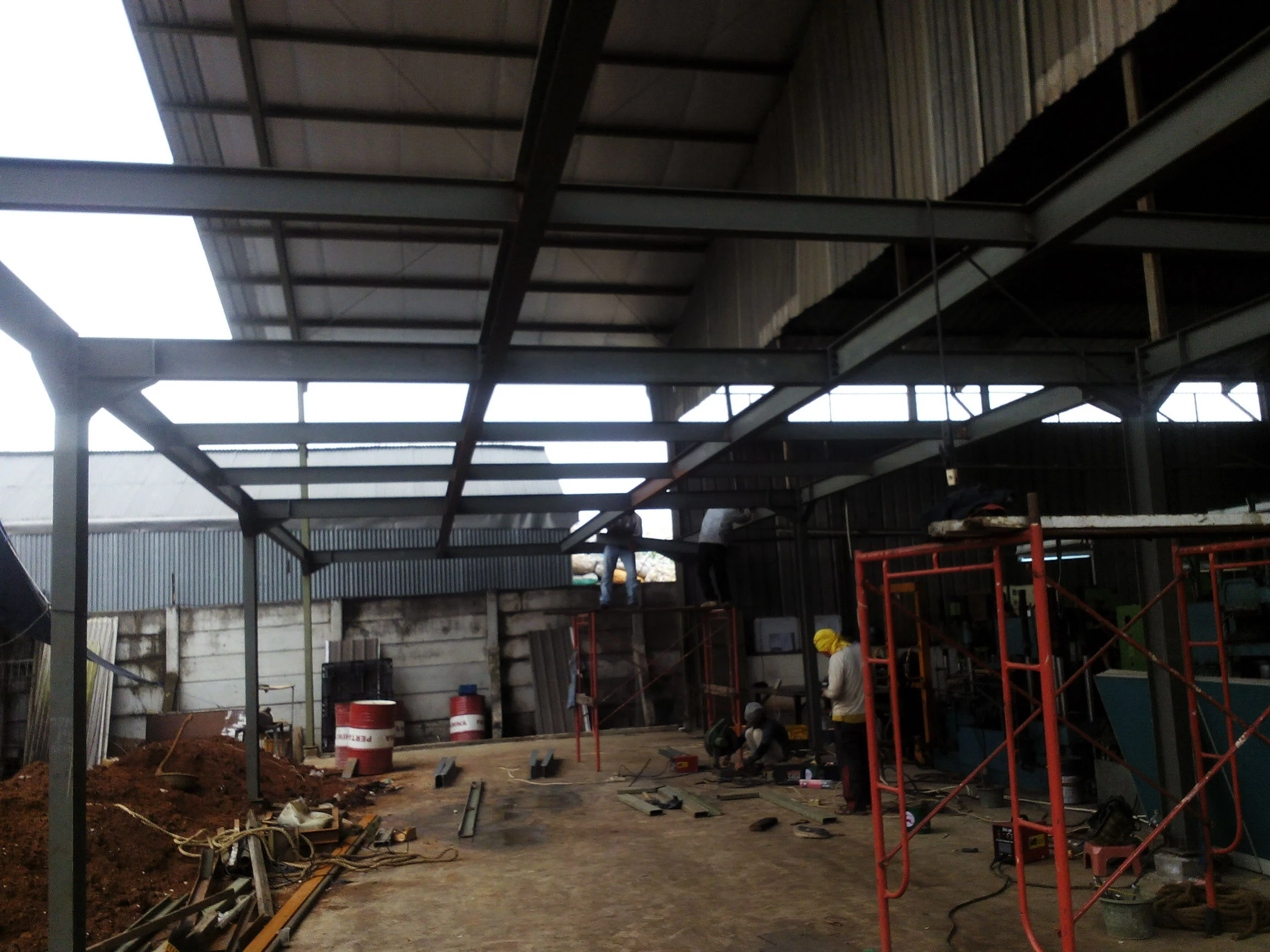 Proyek Pembanguan Mezanin Pabrik Pengolahan Karet - PHIBA JAYA ABADI - ICUK POERNOMO